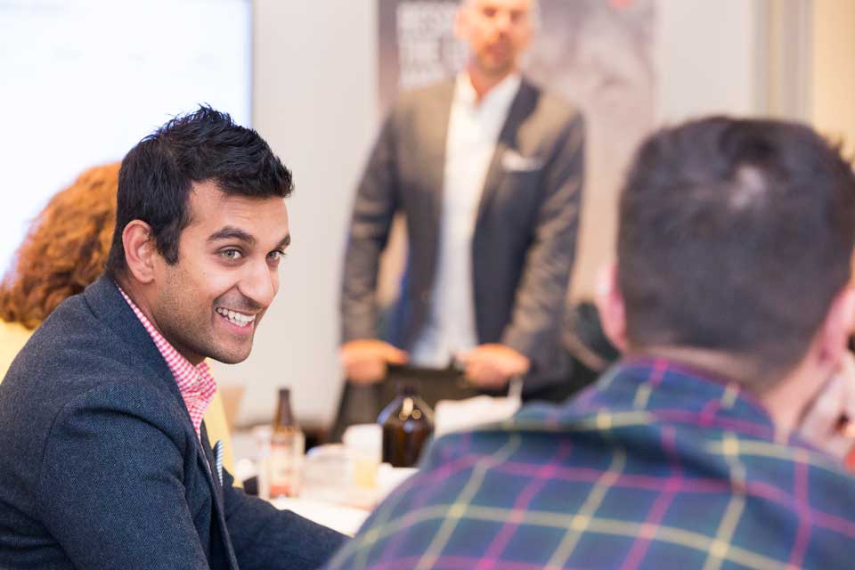 Mark Dobson presenting to room of business people